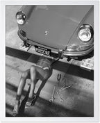 Poster Master Woman Under Classic Car Poster by PosterMaster